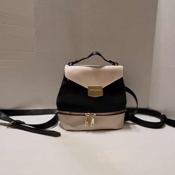 Steve Madden Backpack Purse Black and Cream inside pockets Bag - Picture 2 of 14